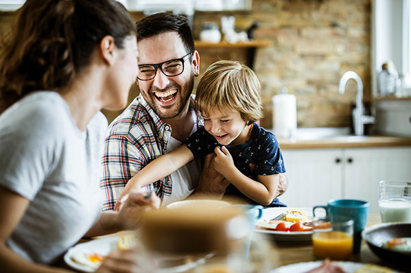 A family of three at the dinner table