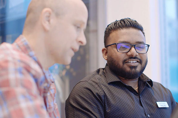 A man having a discussion with his financial advisor